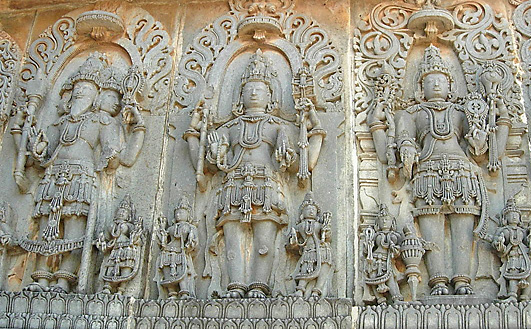 Sculpture of Lords Brahma, Shiva and Vishnu (Hoysaleswara Temple at Halebidu in Karnataka, India)
