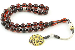 Islamic prayer beads (masbaha) of Baltic amber with knitted silver tassel and marker beads