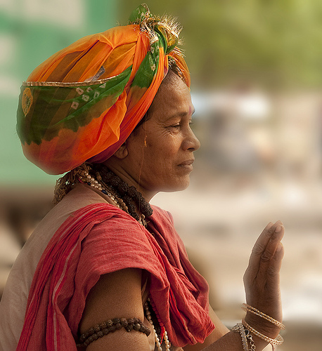 A Hindu sadhvi gives blessings in Northern India.